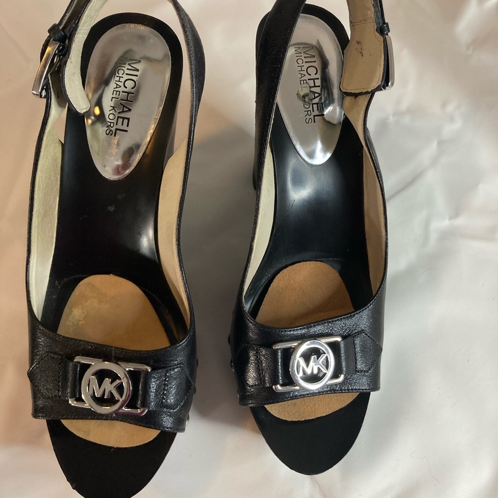 Michael Kors Black Leather and Sliver hardware.